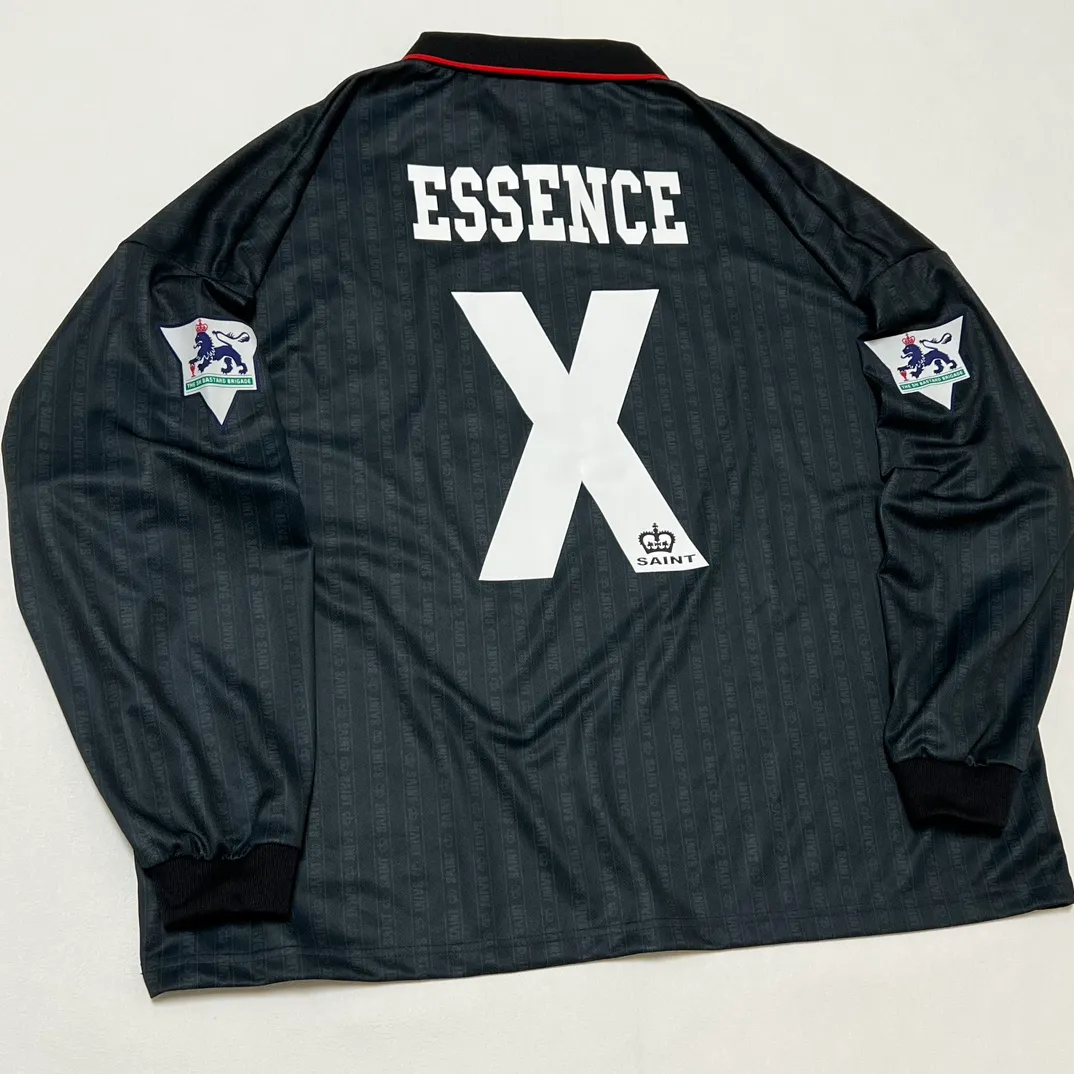 SAINT M×××××× SOCCER SHIRT 'FAITH'/BLK FAITH Football Long Sleeve Black S-XL This design has a lot of craftsmanship Digital fabric printing/front positioning printing laser cutting Offset printing + flocking printing + embossing Imported Behringer machine embroidery Flat machine collar + cuffs Genuine consistent main mark/wash mark/cherub mark